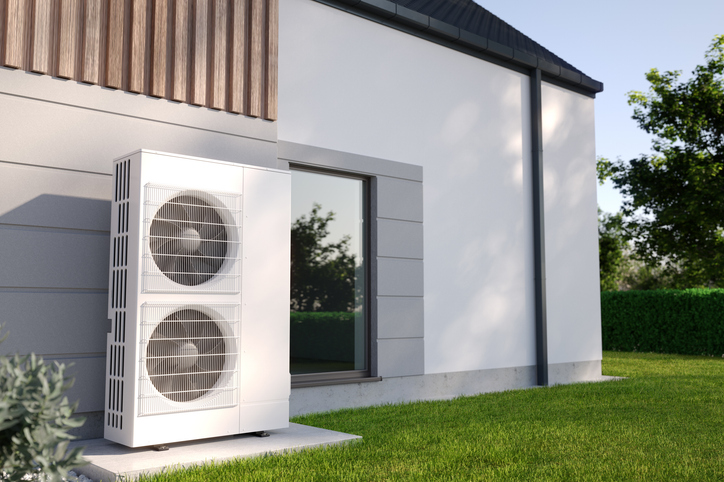 Air heat pumps beside house stock photo