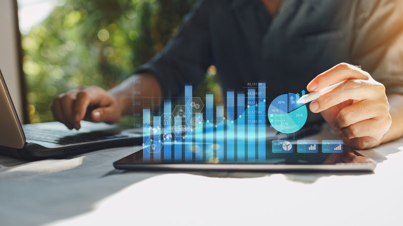 Businessman work with ai for economy analysis financial result by digital augmented reality graph. 