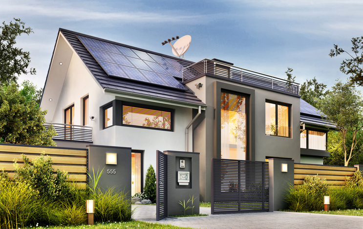 Modern house with garden and solar panels DIY vs. professional fence installation stock photo